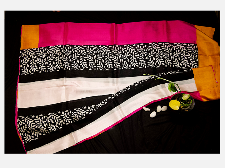 Pink with mix of black,white & yellow Saree