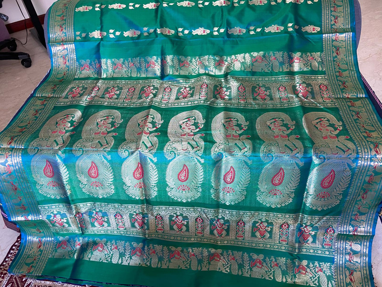 Green with golden and red thread work Saree