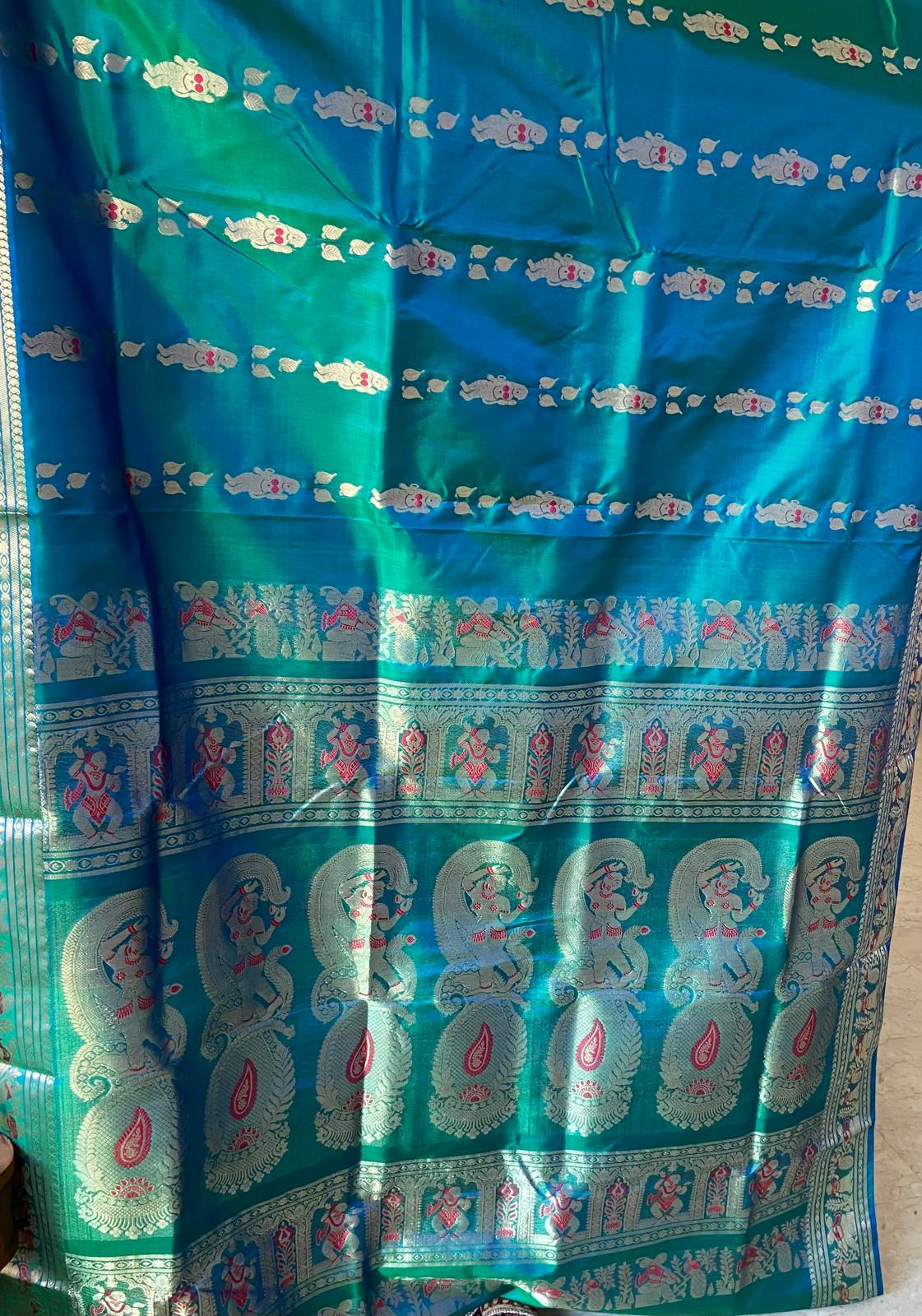 Green with golden and red thread work Saree