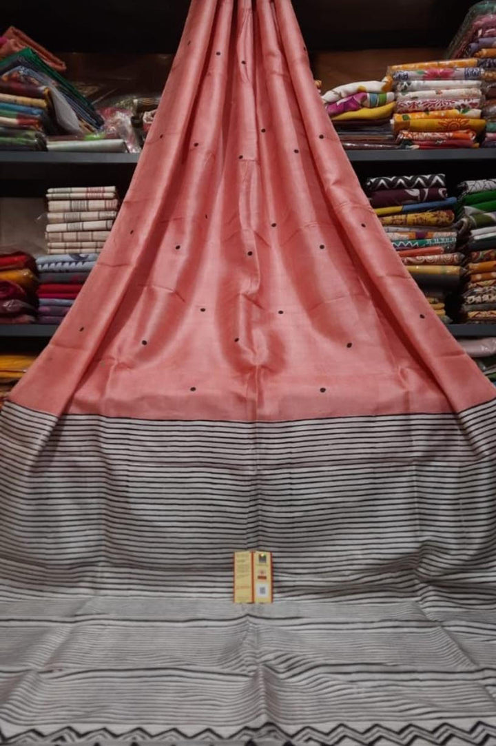 Peach with black polka dots